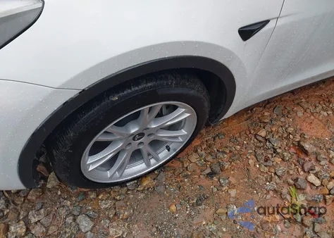 2023 Tesla Model Y Awd/Long Range Dual Motor All-Wheel Drive from USA, damaged, VIN 7SAYGDEE6PF802982